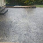 patterned concrete patio freshly sealed