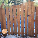 treated and stained wooden fence