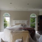 Interior painting livingroom furniture protected and covered