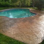 Concrete in ground pool deck sealed